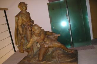 Pomník dvěma padlým a popraveným příslušníkům 33. pěšího pluku „Doss´ Alto
